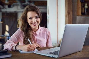 Young Professional Writing Cover Letter young female writing cover letter